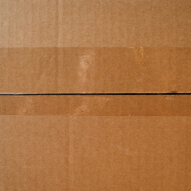 A cardboard box top with tape to illustrate moving company west linn oregon