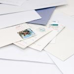 a stack of mail to illustrate Change Of Address Oregon USPS