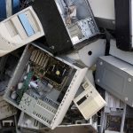 a pile of discarded electronics, computers, and more to illustrate Electronics Recycling Portland