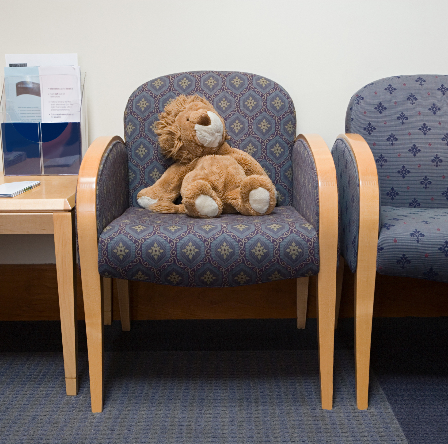 stuffed-lion-on-waiting-room-chair